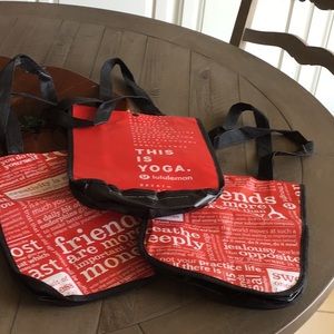 Three reusable Lululemon bags with top snap.